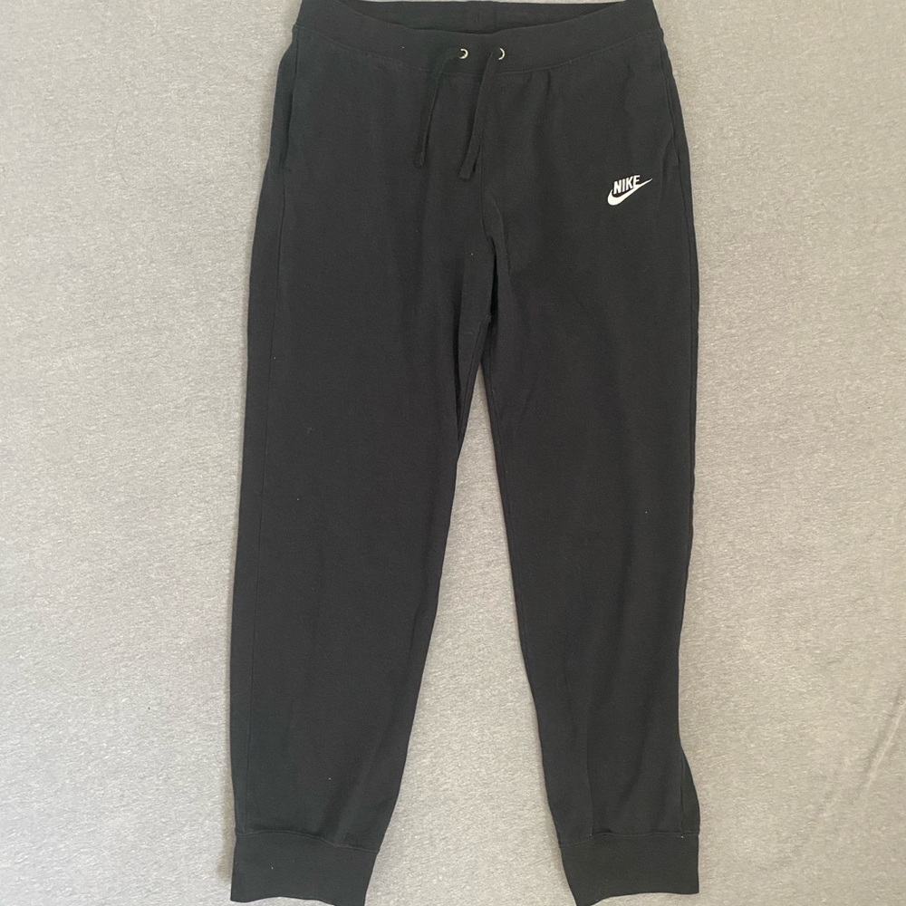 Nike Black Track Pants with Tapered Fit and Elastic Cuffs